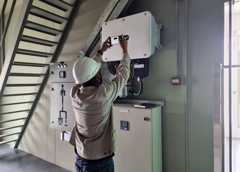 Technician Performing Service